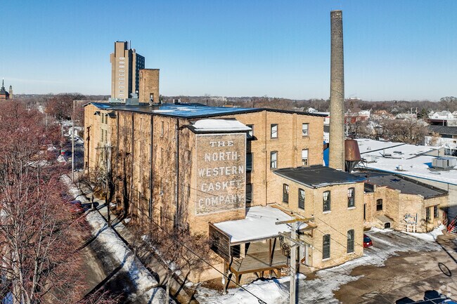 The historic North Western Casket Company building stands as a landmark in Windom Park.