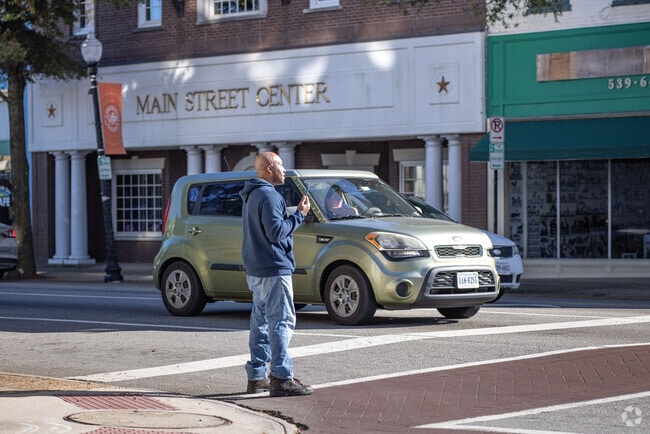 Downtown Suffolk residents get some fresh air by walking down the sidewalks and crosswalks.