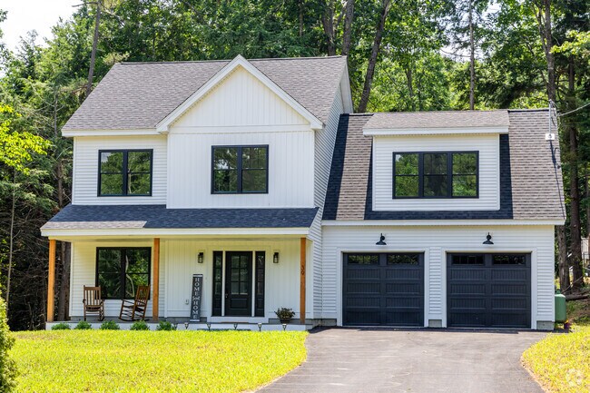A newly built Farmhouse styled home  with nearby lake access in Barnstead, NH.