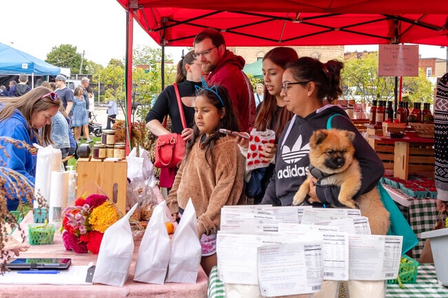 Merrill Algonquin Hills residents take their cute dogs to the Crystal Lake Farmers Market.