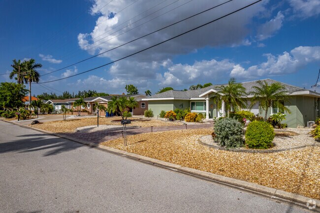 Don't want to deal with grass then fill your yard with shells & rocks in Cortez neighborhood.