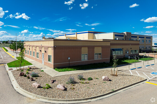 Chavez/Huerta K-12 Preparatory Academy has a drop off area on the side.