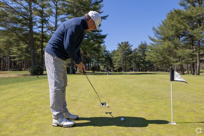 Practice your short game at the Pinehills Golf Club courses in Plymouth.