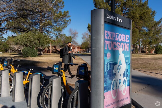 A bike sharing station is on the southern edge of Catalina Park in West University.