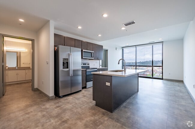 1BR, 1BA - 816SF - Kitchen / Living Room