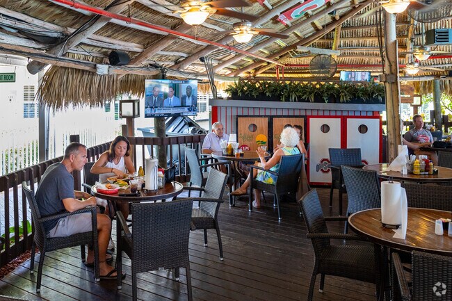 Harold's Place is a lively tropical restaurant with casual dining and drink options.