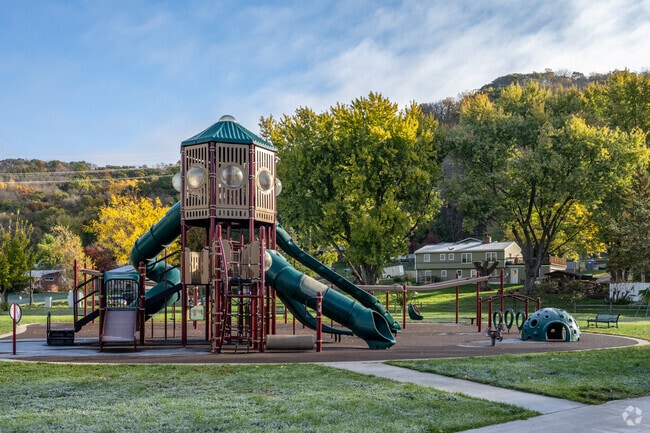 Springbrook-Clayton Johnson families gather at the Springbrook Park playground.