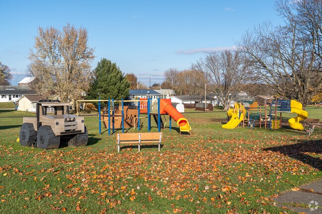 The East Canton Village Park playground has climbing structures, slides & a truck replica.