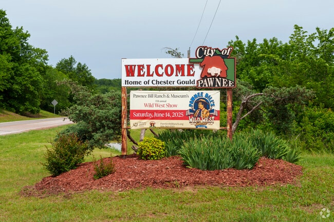 The Central Pawnee sign welcomes visitors and residents to the warm city.