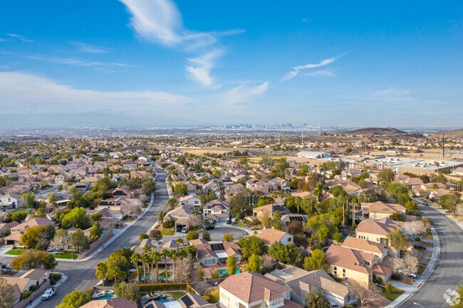 Sun City Anthem communities have lots of greenery and palm trees.