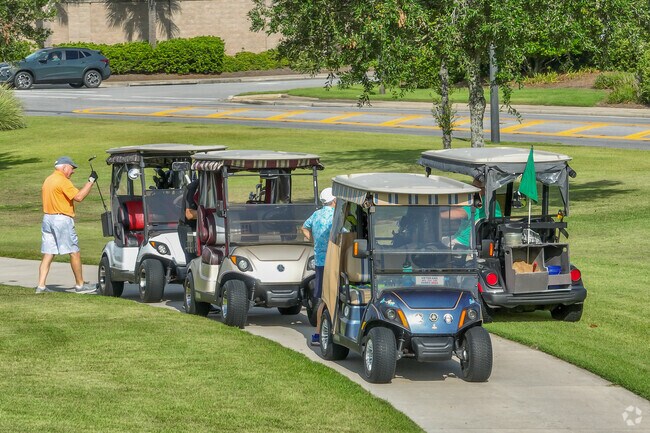 Village of Fernandina residents get lined up at Bonifay Country Club to get out on the course.