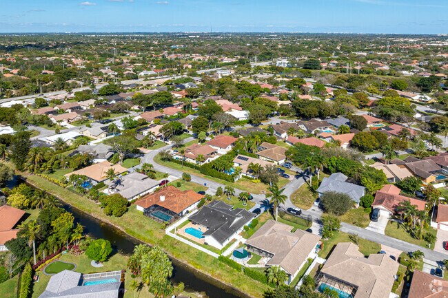 The aerial overview of Crossings shows some homes have pools.