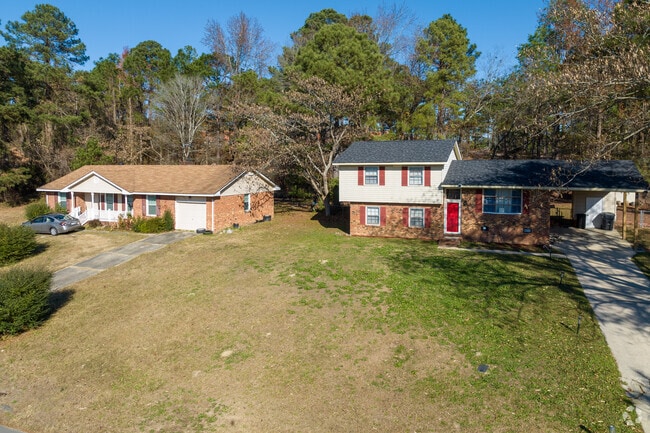 There are a variety of home types like split-level and ranch houses in Pine Forest.
