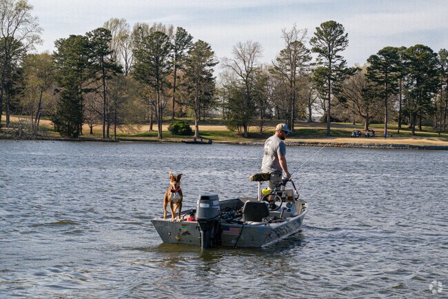 Dogs in Deep River love tagging along for fishing trips at Oak Hollow Lake.