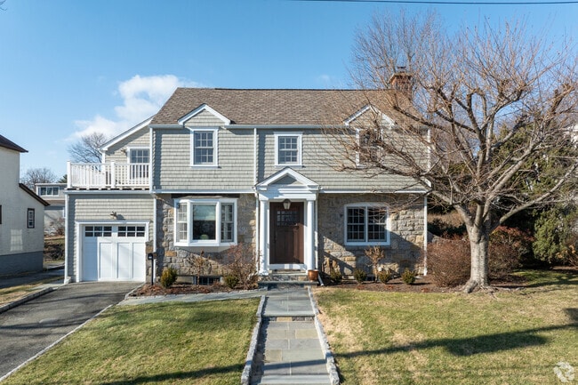 New Traditional homes as this one are well represented in the Old Scarsdale community.
