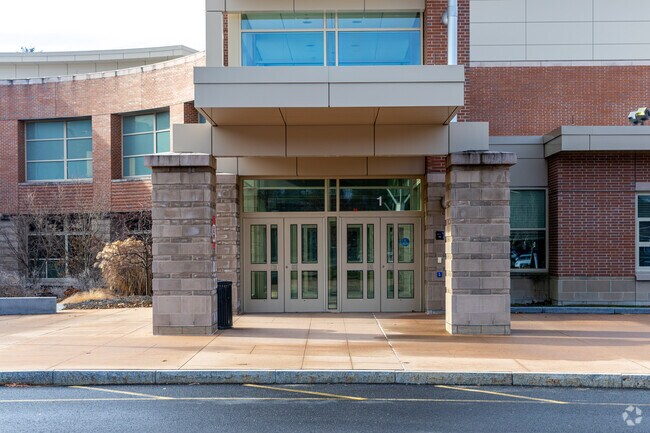 The main entrance of the Tewksbury Memorial High School in Tewksbury, MA.