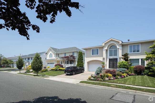 Rows of newer/larger colonial homes can be found in E Atlantic Beach on the bay side of town.
