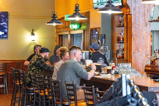 The Tommyknocker Brewery & Pub in Idaho Springs near Floyd Hill serves up craft brews in a hip, industrial-themed setting.