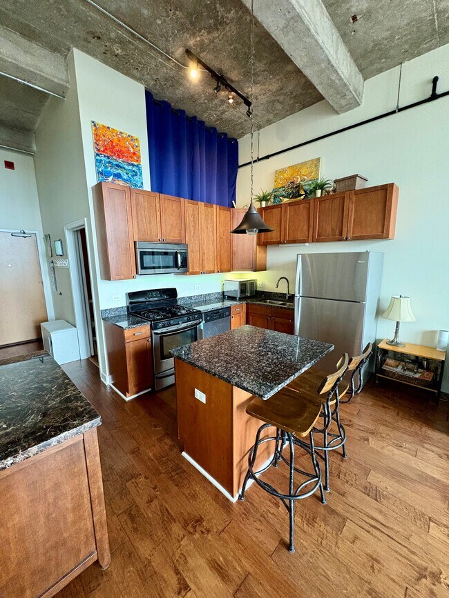 kitchen and entry to 2nd bed