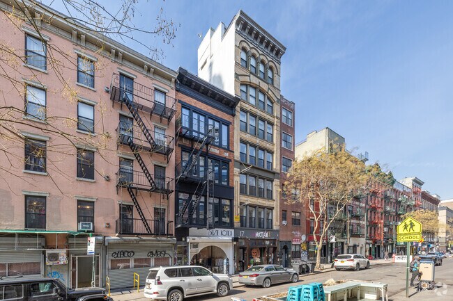 Modern condos can be found alongside tenement-style buildings.