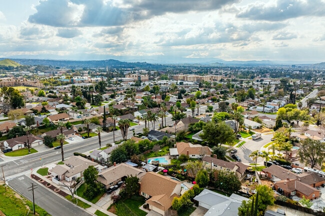 An aerial view of the University neighborhood shows homes and their close proximity to shops.