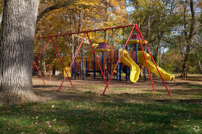 Morgan Grove Park offers a playground shaded by large trees in Shepherdstown.