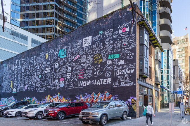The mural on 1st Ave in Belltown adds flare to an ordinary parking lot.