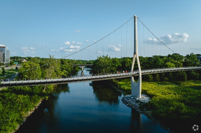 Riverside Crossing Park features a pedestrian bridge over the Scioto river.
