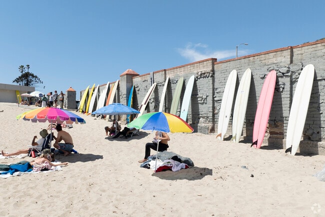 Surfers and swimmers love catching the waves at Surfers Beach near El Nido.