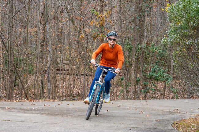 The picturesque Roswell Greenway Bike Trail winds through lush landscapes and picturesque scenery, ultimately connecting to the expansive Big Creek Greenway Trail, where cyclists can enjoy a scenic ride along the serene waterways and vibrant natural surroundings.