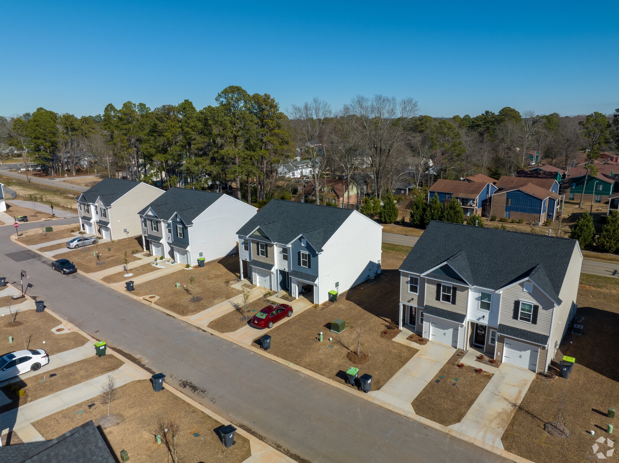 Planned out Townhouse development  one side of street with 4 houses