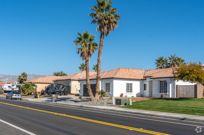 The scene of tilt-roofed single-family homes lining the streets of Thousand Palms.