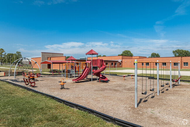 Playground equipment at Strafford Elementary School awaits students on recess.