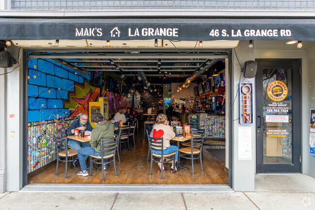 Locals can enjoy a flavorful burger at lunch or a drink with friends at Mak's House La Grange.