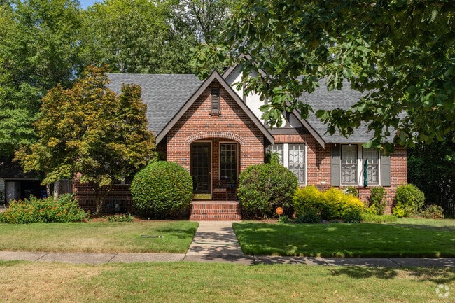 Tudor style homes are common in Saint Elmo Weracoba featuring beautiful red brick.