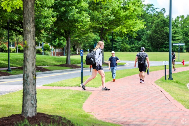 Students walk around the campus of UNCC located in University City North.