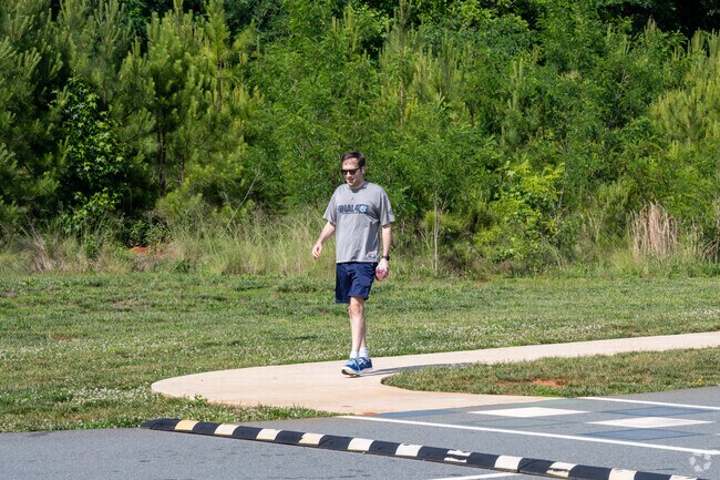 Runners and walkers from Swepsonville enjoy exercising at Graham Regional Park.