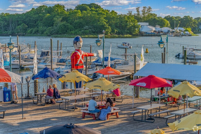 Locals can enjoy an evening by the water at Captain's Cove Seaport near Black Rock.