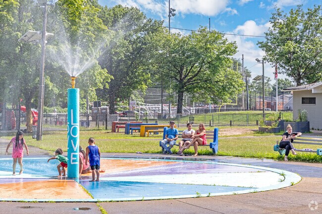 Children splash and play at the colorful spray pad in Totowa Section’s Grace Buckley Park.