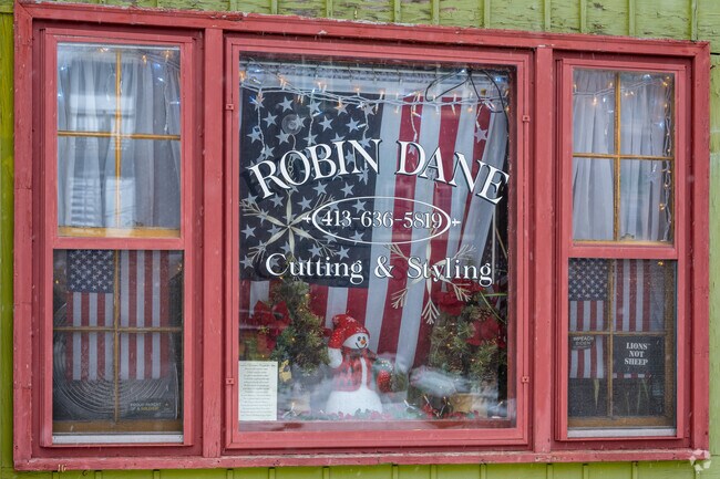 A salon in Depot Village in Palmer decorated its window.