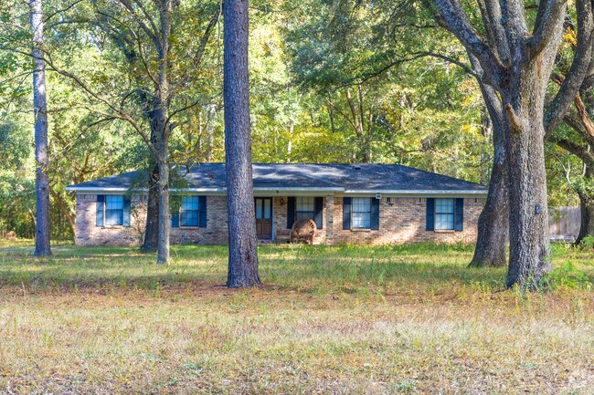Mobile Terrace offers many homes that are shaded by tall trees.