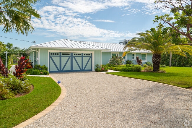 Colorful and stylish single family ranch style in the West End neighborhood of Sanibel Island.