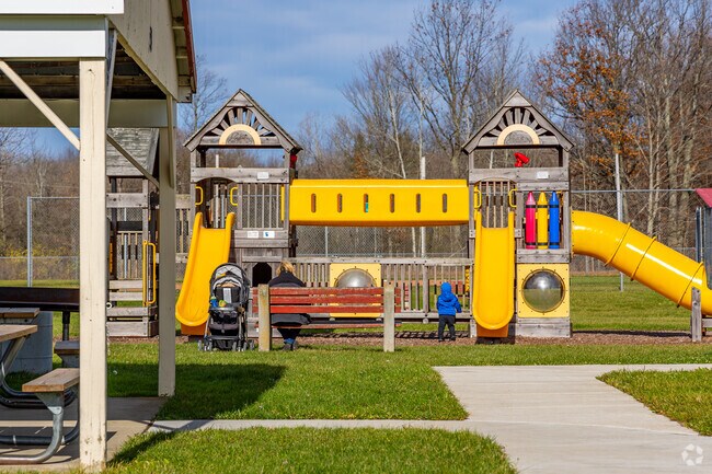 Alden families can play on the playground at Robert O. Smith Memorial Park.