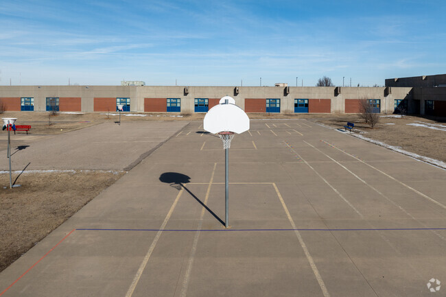 Jackson Elementary School has an outdoor basketball court.