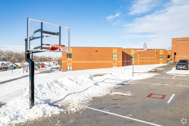 Reagan Elementary School has basketball hoops.