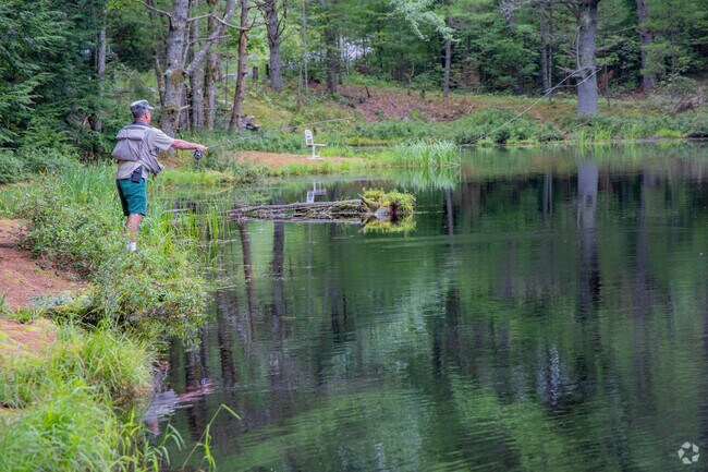 A fisherman trying his luck at one of many lakes in Allenstown.