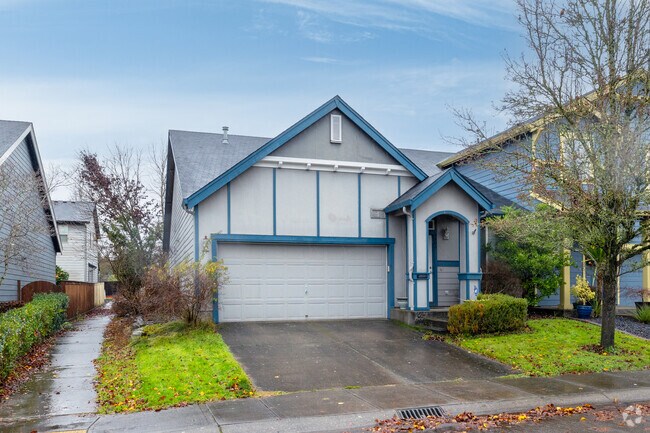 Blue accents highlight a home on NE 48th St in Minnehaha.