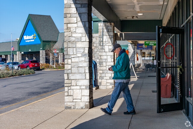 Shoppers enjoy a cool Autumn day at Palomar Centre in Harrods Hill.