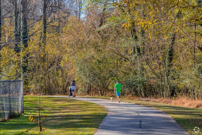 Area residents exercise in the Lionel Hampton-Beecher Nature Preserve.
