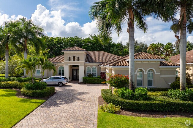 Spacious driveways and large front gardens are essentials in Boca Delray neighborhood.